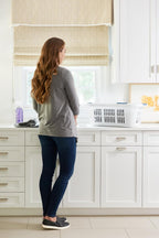 Rubbermaid Large Hip-Hugger Laundry Basket, White - In use